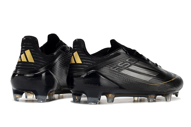 Chuteira Campo Adidas F50 FG Preta, Branca e Dourada "Dark Spark Pack"