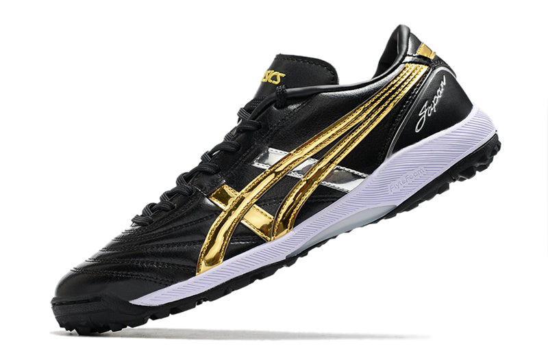 Chuteira Society Asics Japan TF Preta e Dourada