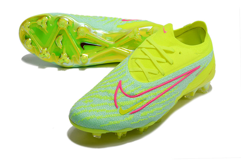 Precisão é com a Chuteira de Campo Nike Phantom GX Elite FG Verde e Rosa na Farda de Boleiro, Garanta a qualidade de Jogadores Profissionais