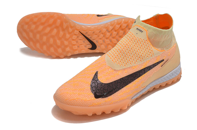 Chuteira Society Nike Phantom GX DF Elite TF Laranja "Fusion Pack"