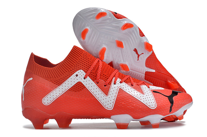 Botes de futbol Puma Future Ultimate FG vermelles i blanques