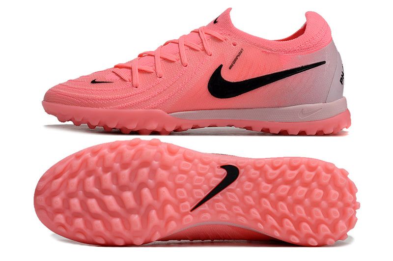 Bota de futbol per a nens Nike Phantom GX 2 Elite TF rosa "Mad Brilliance". 