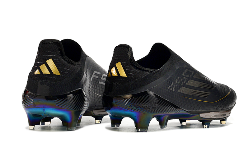 Botes de futbol Campo F50+ LL FG negre i daurat "Dark Spark Pack". 