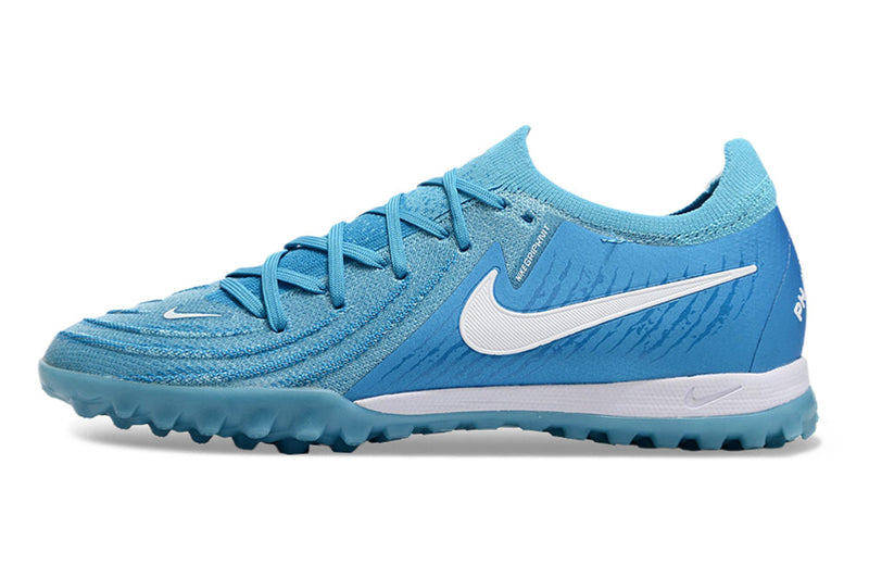 Chuteira Infantil Society Nike Phantom GX 2 Elite TF Azul "Mad Ambition Pack"