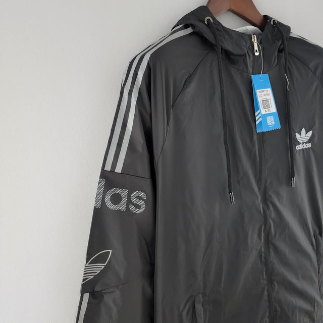 Nome do Produto: Corta Vento Adidas Preto e Cinza Produto: Corta Vento Cores: Preto e Cinza Marca: Adidas Categoria: Conjuntos Esportivos e Corta Ventos Gênero: Masculino |Frete Grátis para todo Brasil | Farda de Boleiro