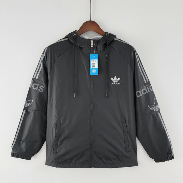 Nome do Produto: Corta Vento Adidas Preto e Cinza Produto: Corta Vento Cores: Preto e Cinza Marca: Adidas Categoria: Conjuntos Esportivos e Corta Ventos Gênero: Masculino |Frete Grátis para todo Brasil | Farda de Boleiro