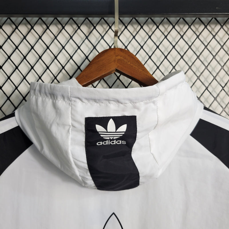 Nome do Produto: Corta Vento Adidas ADN 10K Branco e Preto Produto: Corta Vento  Cores: Branco e Preto  Marca: Adidas Categoria: Corta Vento - Adidas Gênero: Unissex |Frete Grátis para todo Brasil | Farda de Boleiro