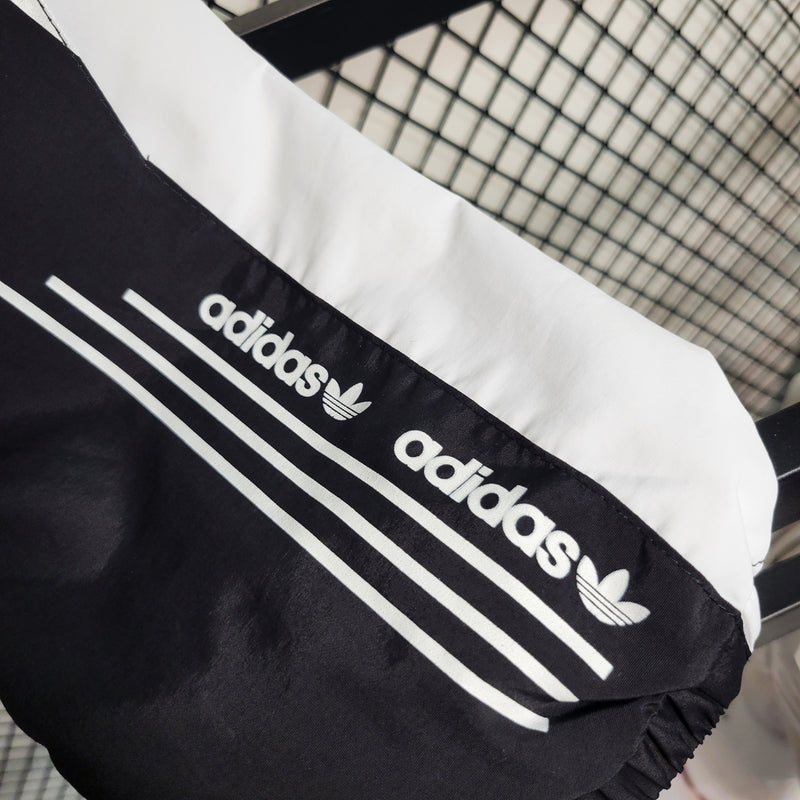 Nome do Produto: Corta Vento Adidas ADN 10K Preto e Branco Produto: Corta Vento  Cores: Preto e Branco Marca: Adidas Categoria: Corta Vento - Adidas Gênero: Unissex |Frete Grátis para todo Brasil | Farda de Boleiro