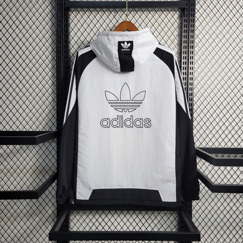 Nome do Produto: Corta Vento Adidas ADN 10K Branco e Preto Produto: Corta Vento  Cores: Branco e Preto  Marca: Adidas Categoria: Corta Vento - Adidas Gênero: Unissex |Frete Grátis para todo Brasil | Farda de Boleiro