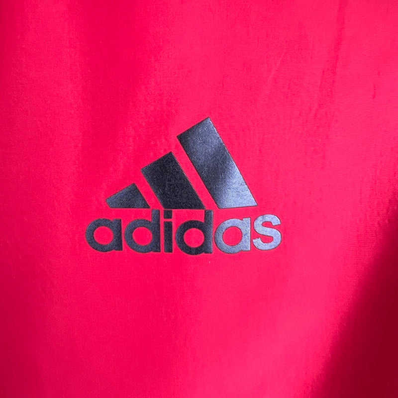 Nome do Produto: Corta Vento Adidas Vermelho Produto: Corta Vento  Cores: Vermelho Marca: Adidas Categoria: Corta Vento - Adidas Gênero: Unissex |Frete Grátis para todo Brasil | Farda de Boleiro